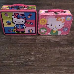 Two tan hello kitty Lund boxes